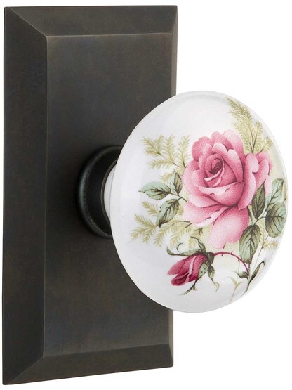 New York Rosette Door Set with Rose Porcelain Knobs in Oil-Rubbed Bronze.